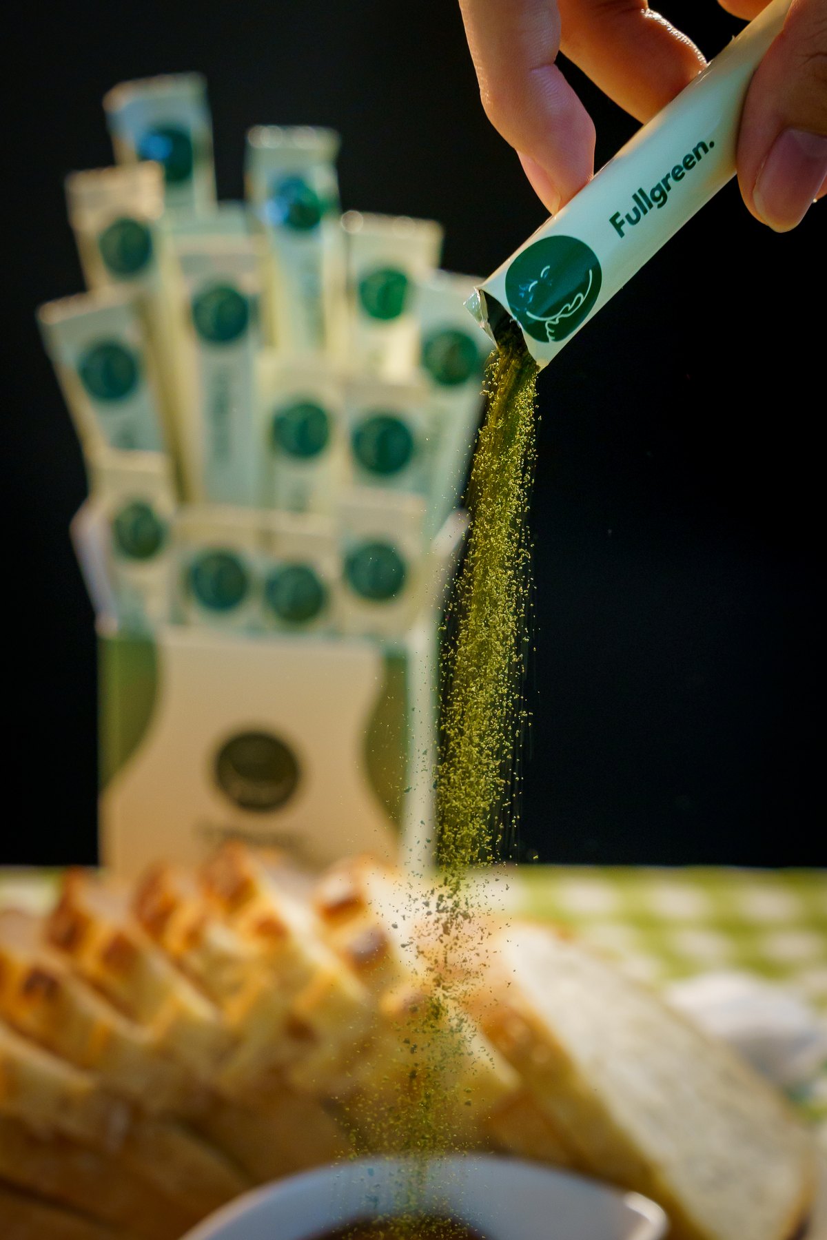 Fullgreen dried Wolffia powder — sachet in hand